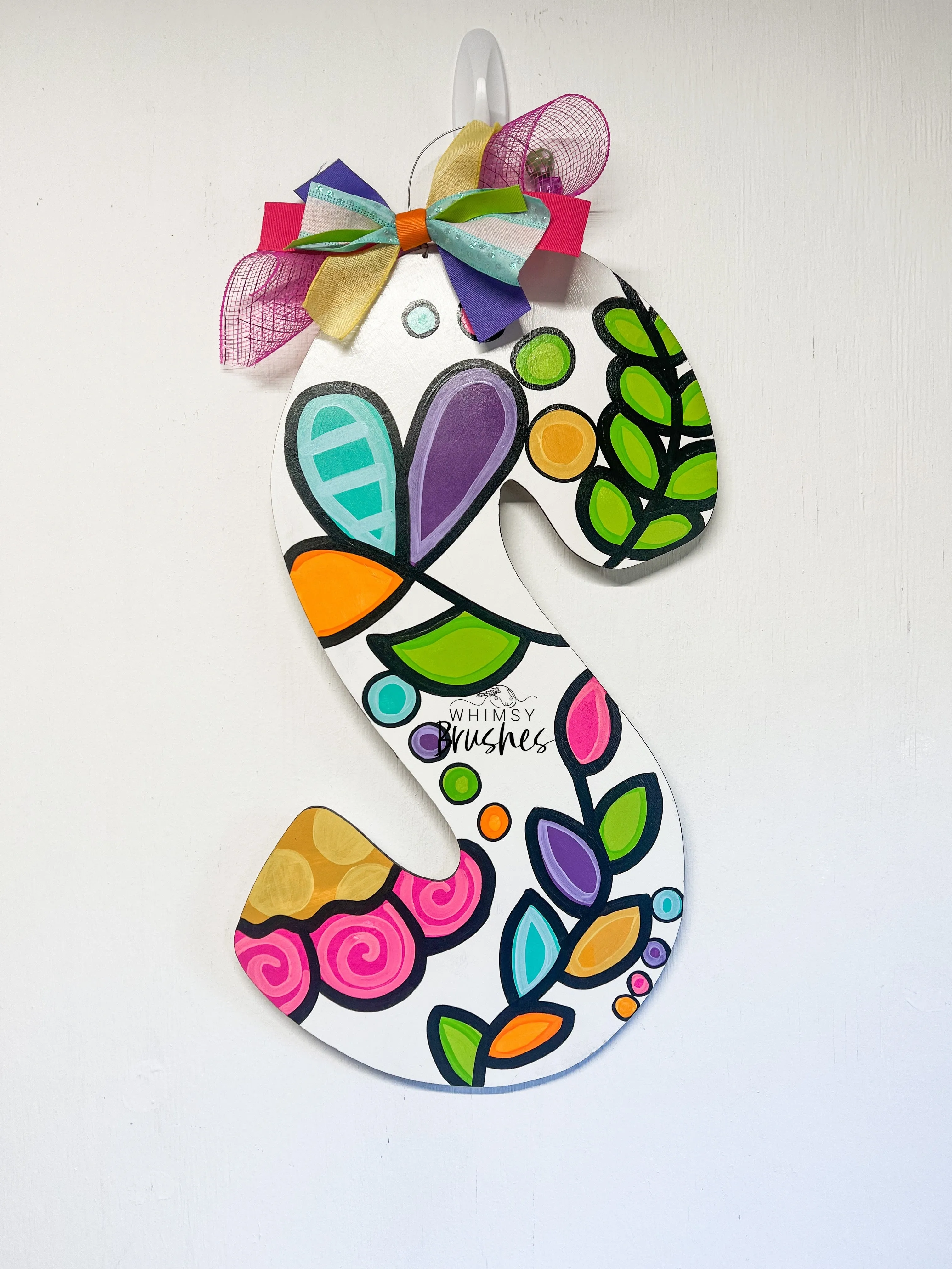 Bright and Colorful Inital Doorhanger