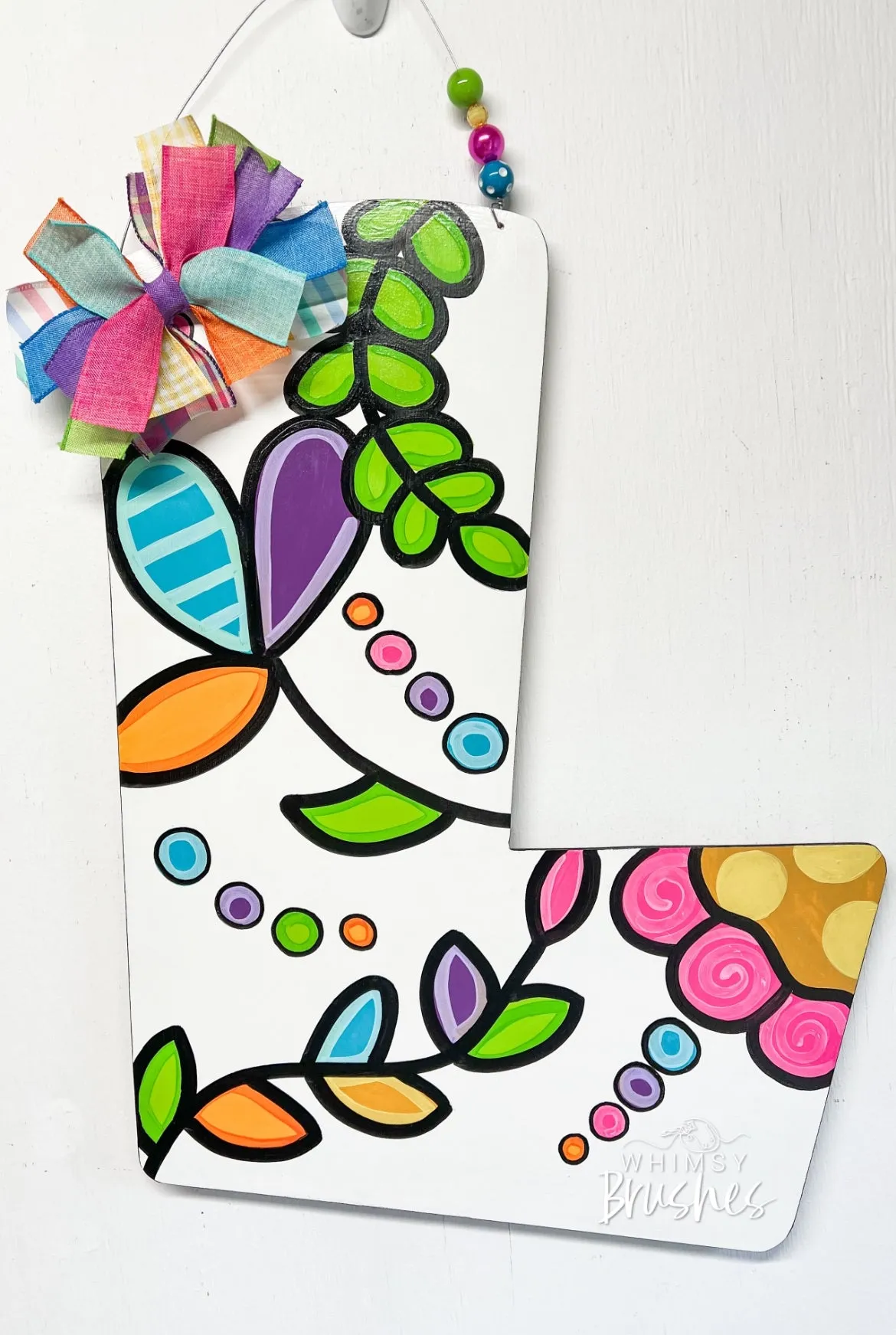 Bright and Colorful Inital Doorhanger