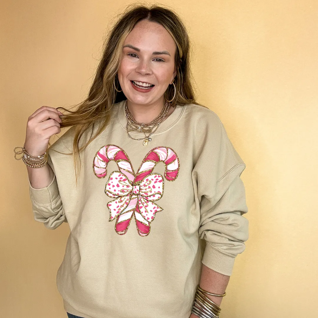 Online Exclusive | Pink Swirl Candy Cane Tied with Bow Graphic Sweatshirt in Multiple Color Options